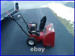 Craftsman snow blower, red, 24, electric start. Slightly used