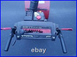 Craftsman snow blower, red, 24, electric start. Slightly used