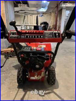 Yard Machines 24in 179cc Two-Stage Gas Snow Blower, Electric Start, Red/Black