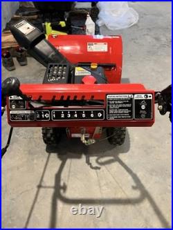 Yard Machines 24in 179cc Two-Stage Gas Snow Blower, Electric Start, Red/Black